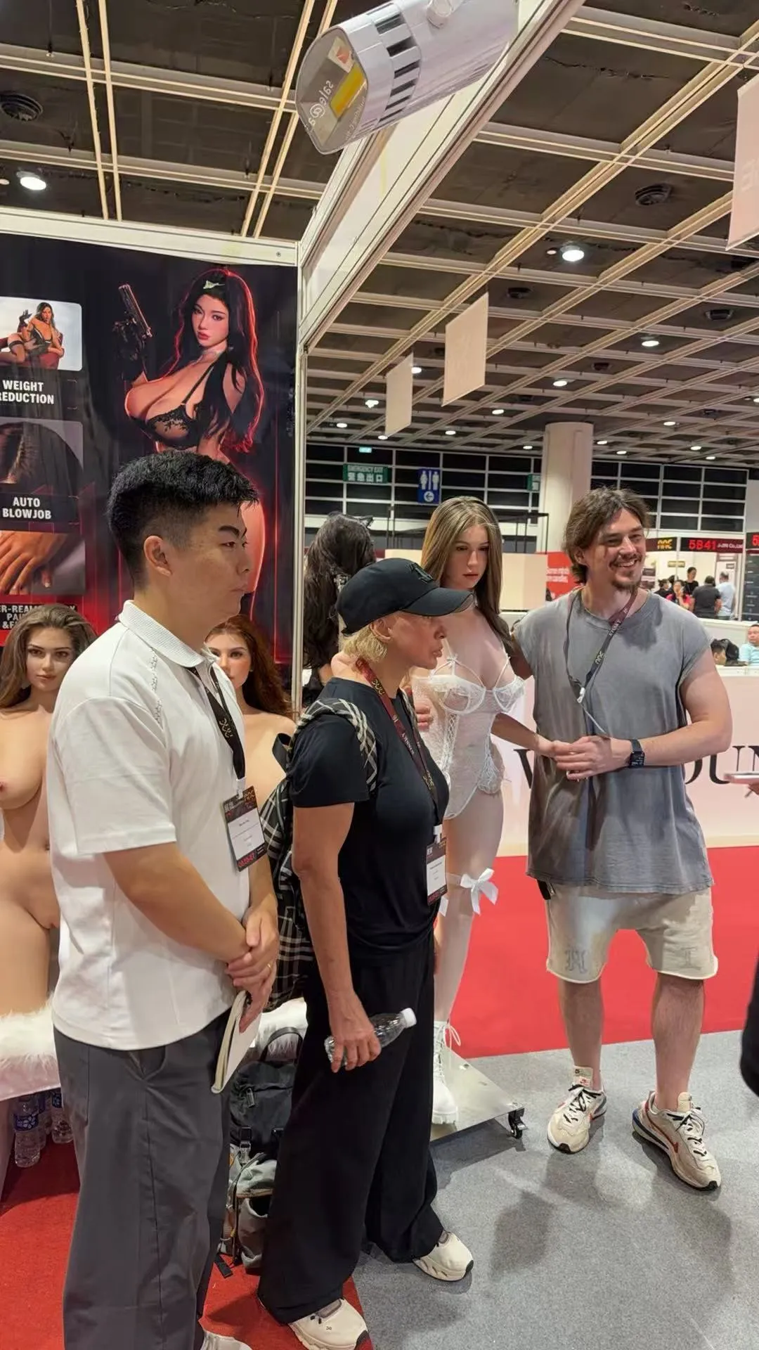Lovmour team speaking with international visitors at AAE 2026 Hong Kong